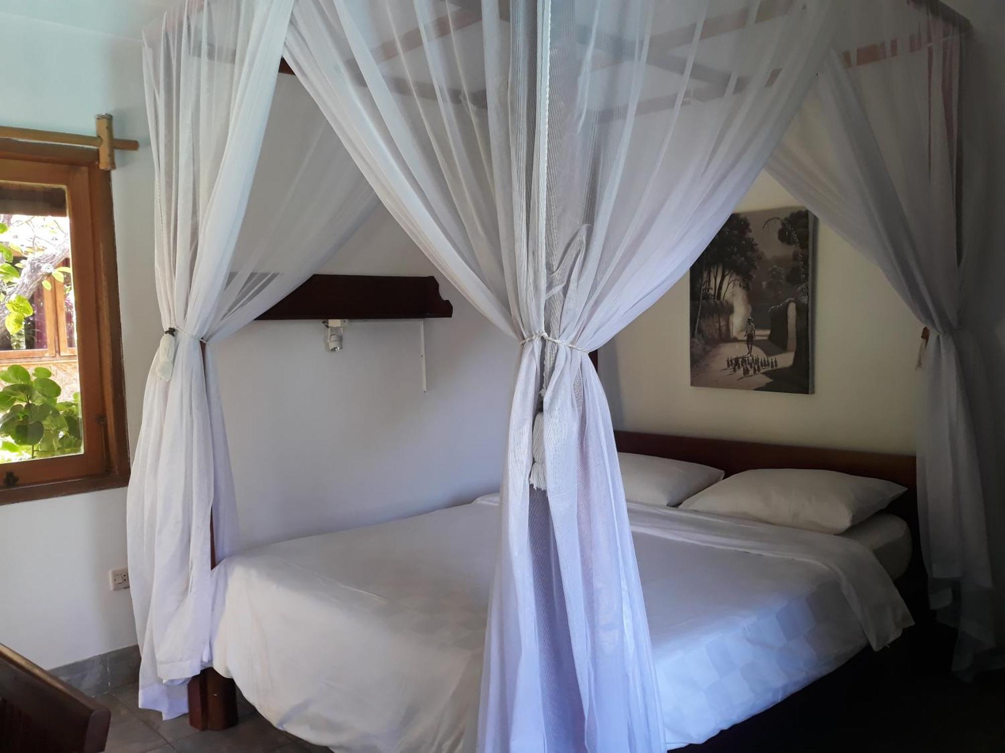 Le Jardin Hotel Amed Стая снимка