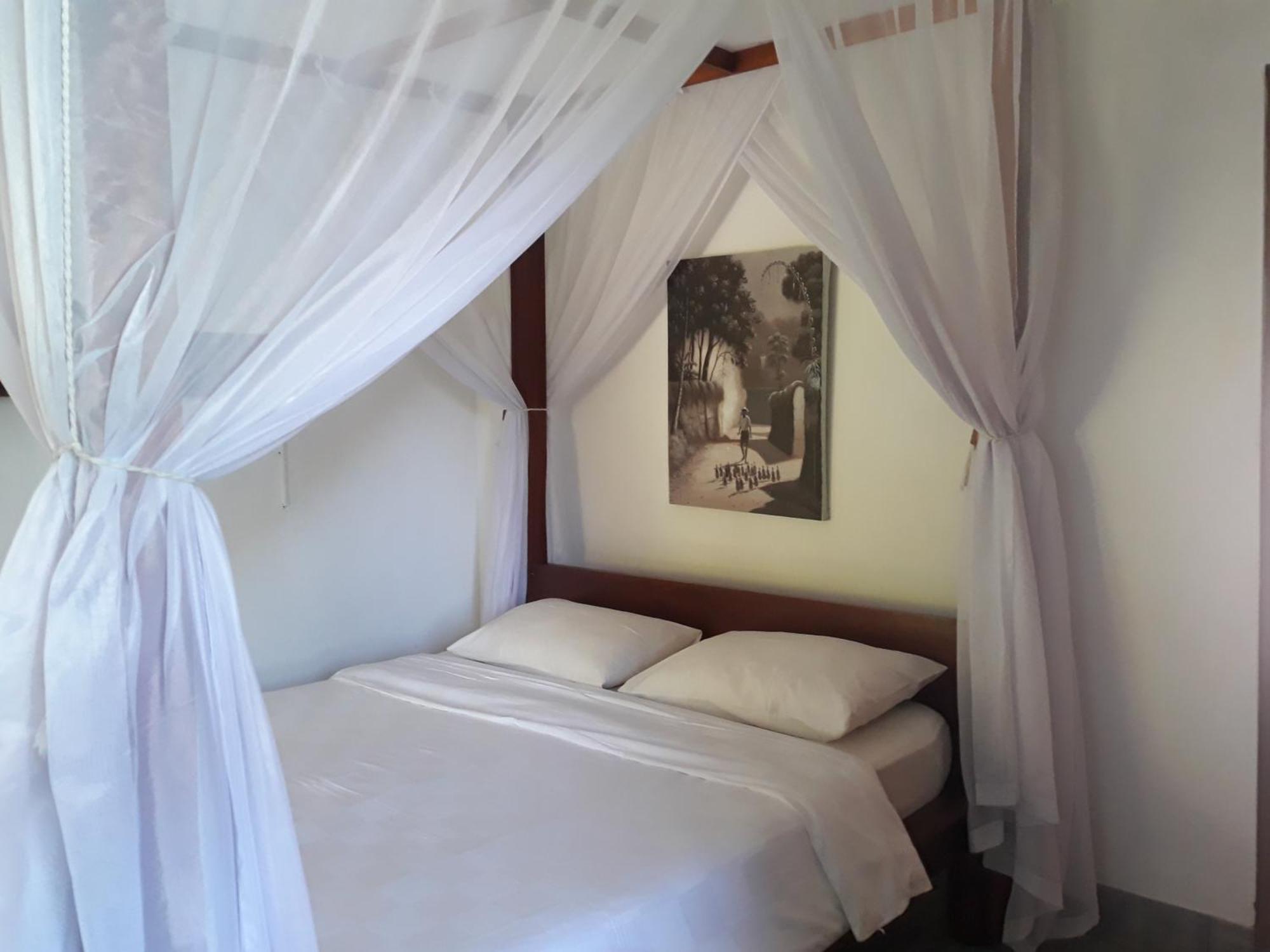 Le Jardin Hotel Amed Стая снимка